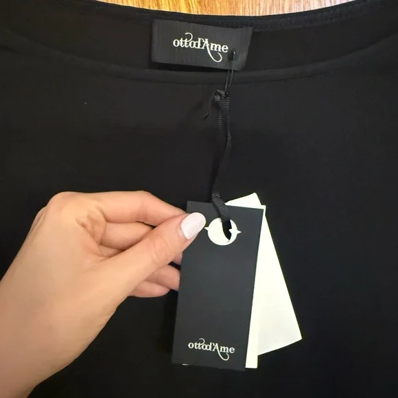 Elegant Black Long Sleeve Blouse with Feather Detail - Picture 7 of 11